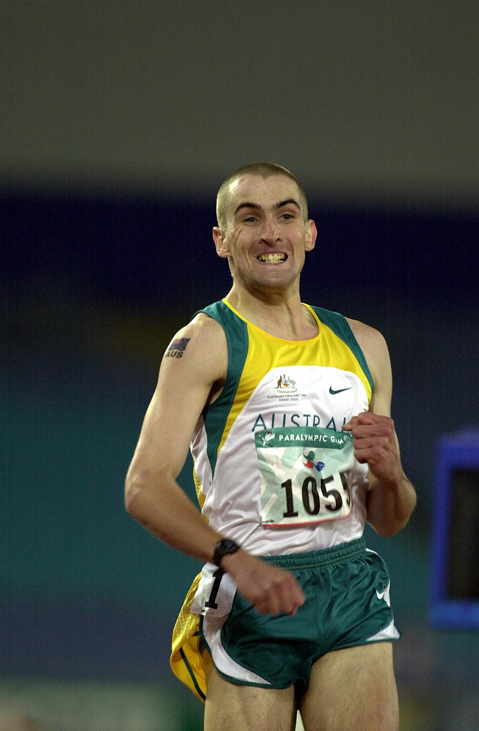 Tim Sullivan at the Sydney 2000 Paralympics: Men's 200m T38 final; gold; race action