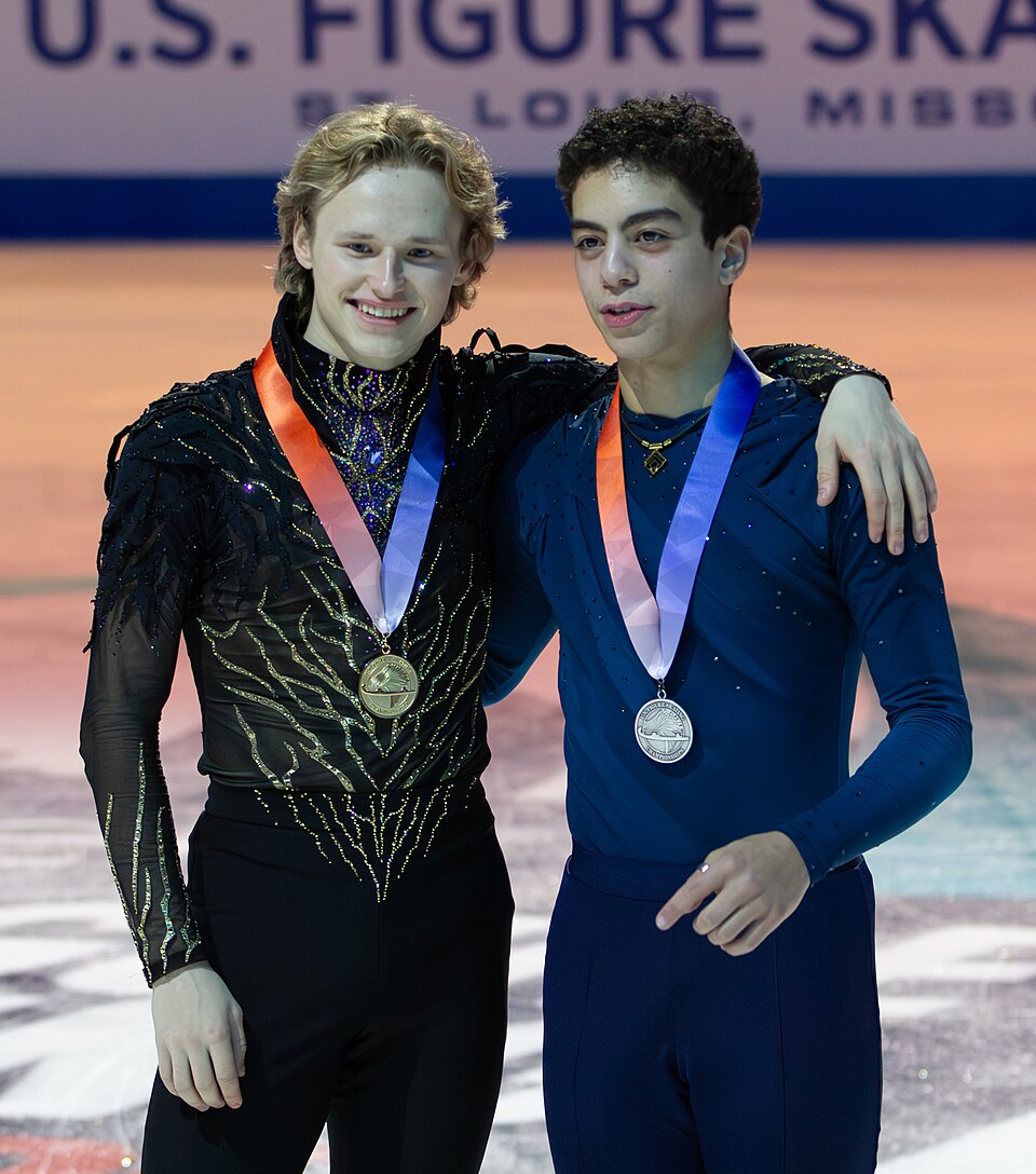 Ilia Malinin and Jacob Sanchez at the 2026 US Figure Skating Championships medal ceremony on 10 January; Chock and Bates are not pictured