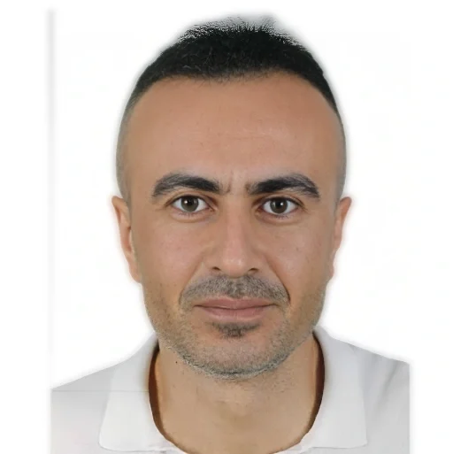 Hikmet Türkay in an official Kastamonu University profile portrait